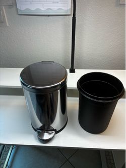 Genuine Simplehuman stainless steel step trash can in excellent condition.