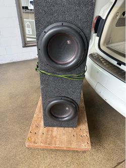 2  12 inch subs  in a custom Box MDF wood