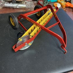 New Holland     Metal And Plastic. Hay Rake 8 Inches Long Like New Condition  Made Of Metal And Plastic Blades