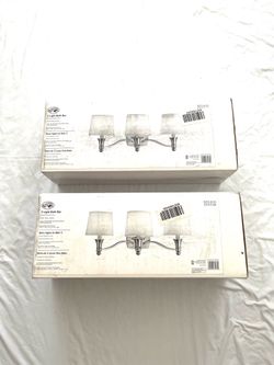 (2) brand new in the boxes (Hampton Bay) 3 light bath bar light fixtures.