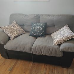 Brown leather loveseat 