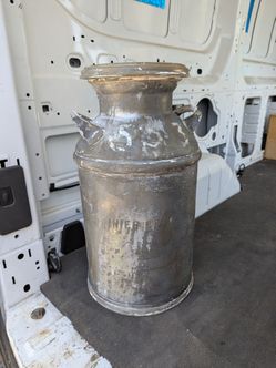 Vintage metal milk jug/container