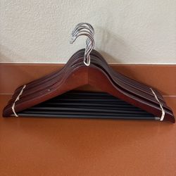9 cherry wood tone hangers
