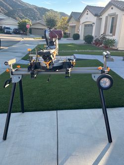 Miter Saw including stand