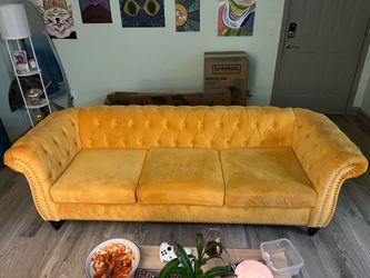 Yellow velvet couch