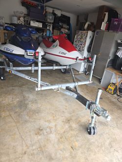Selling My JET SKI TRAILER INCLUDING 2 JET SKIS