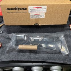 Surefire tactical light with pressure switch