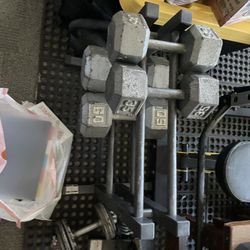 Weights 35s , Adjustable 25s, And Small Weight Rack