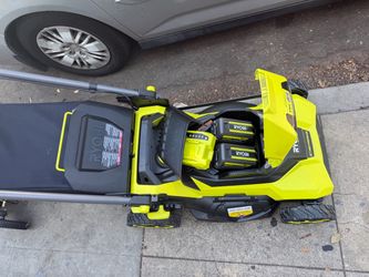 Lawnmower ryobi self propelled come w fast charger &1- 6ah battery new $270 firm