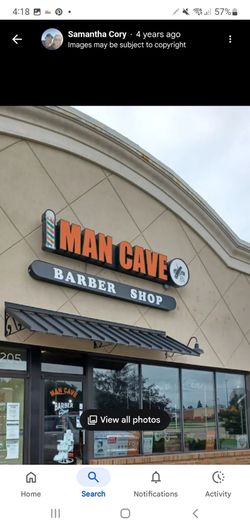 Man Cave commercial Sign.      'Needs Gone"