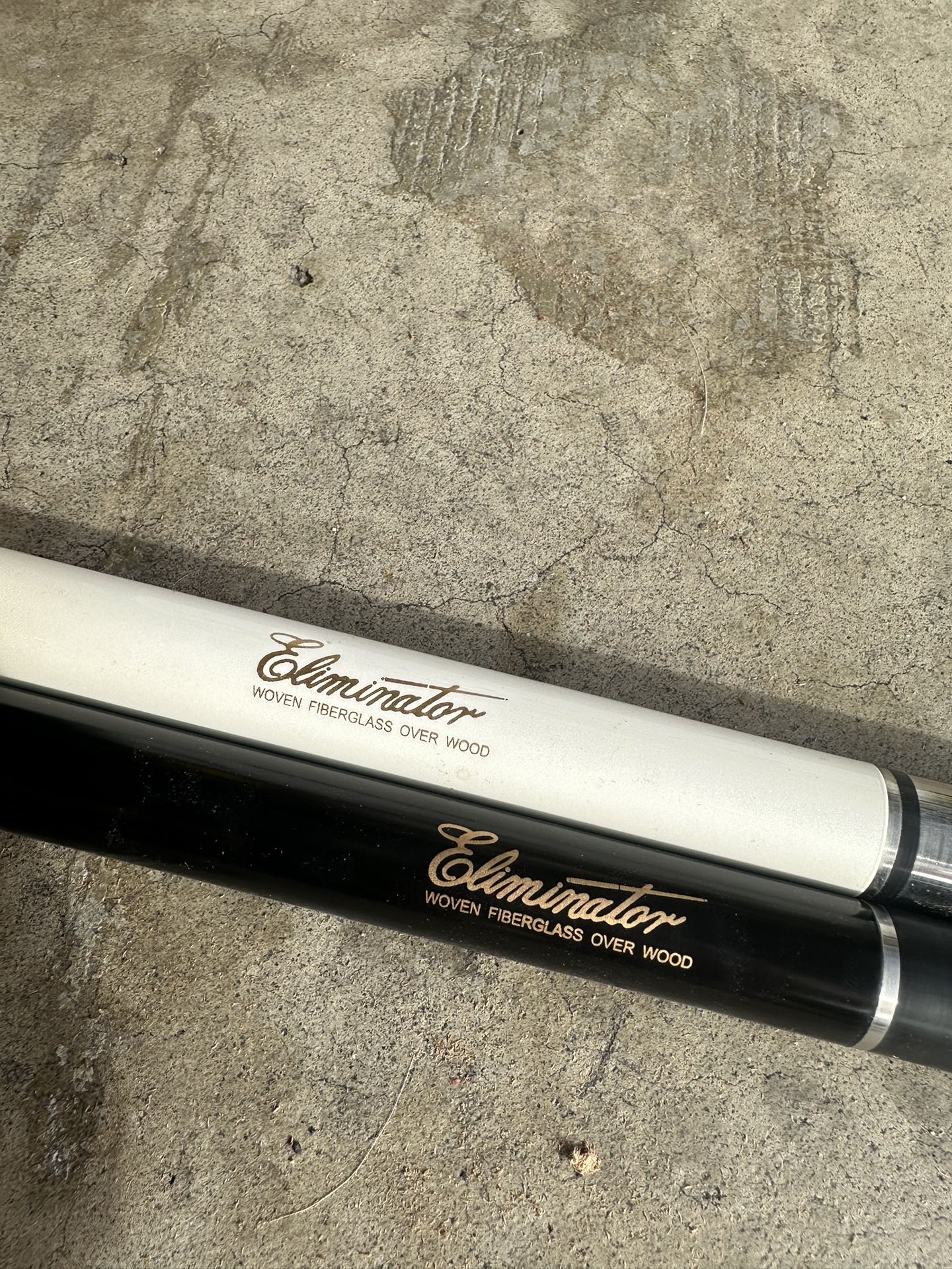 Two Eliminator Pool Cues