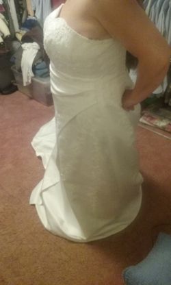 Beautiful white pearl wedding dress size 20 has been dry clean in excellent condition
