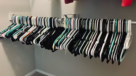 Clothing hangers - around 200 big, and 3 small