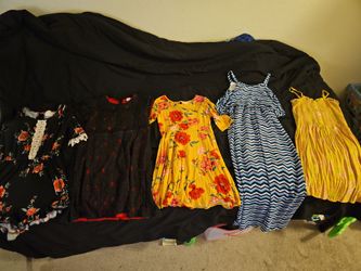 Girls dresses and 1 romper size Large