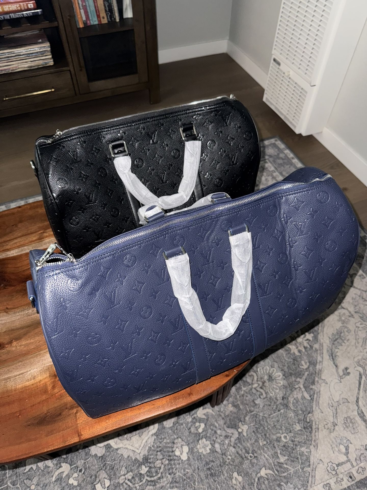 L V Duffle Bags