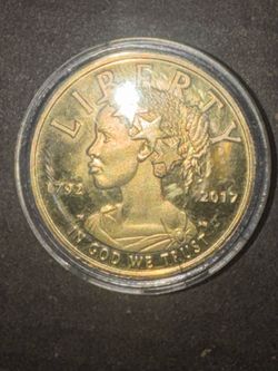 One hundred dollar gold coin