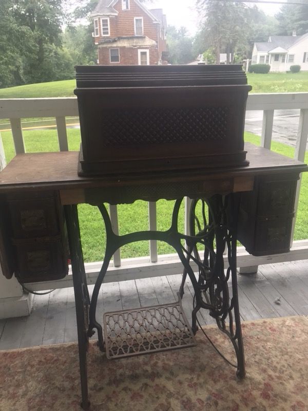 Antique sewing machine never been touched dated 1884