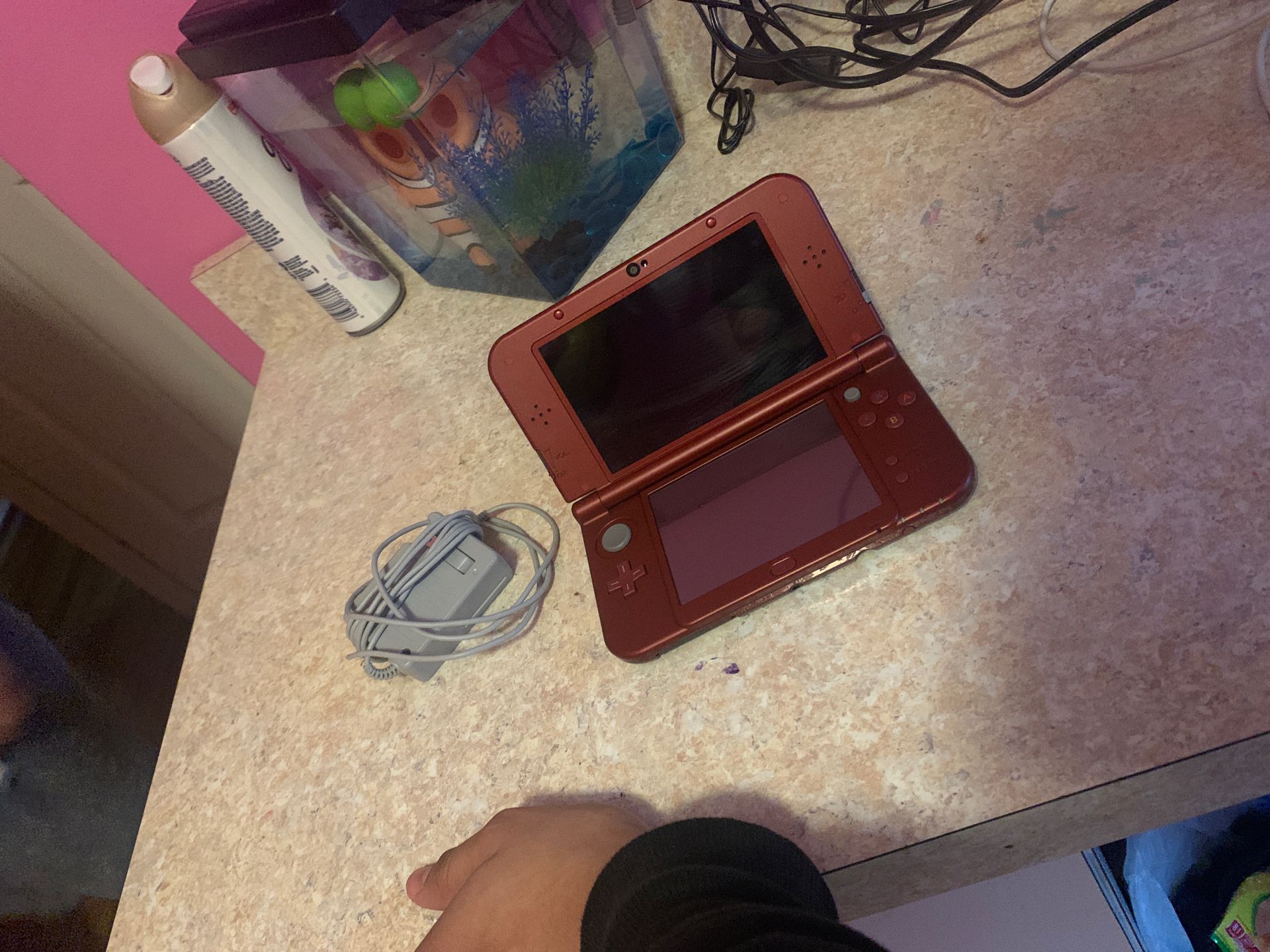 Nintendo 3 DS with charger and one game (super mario bros) no lower than 140