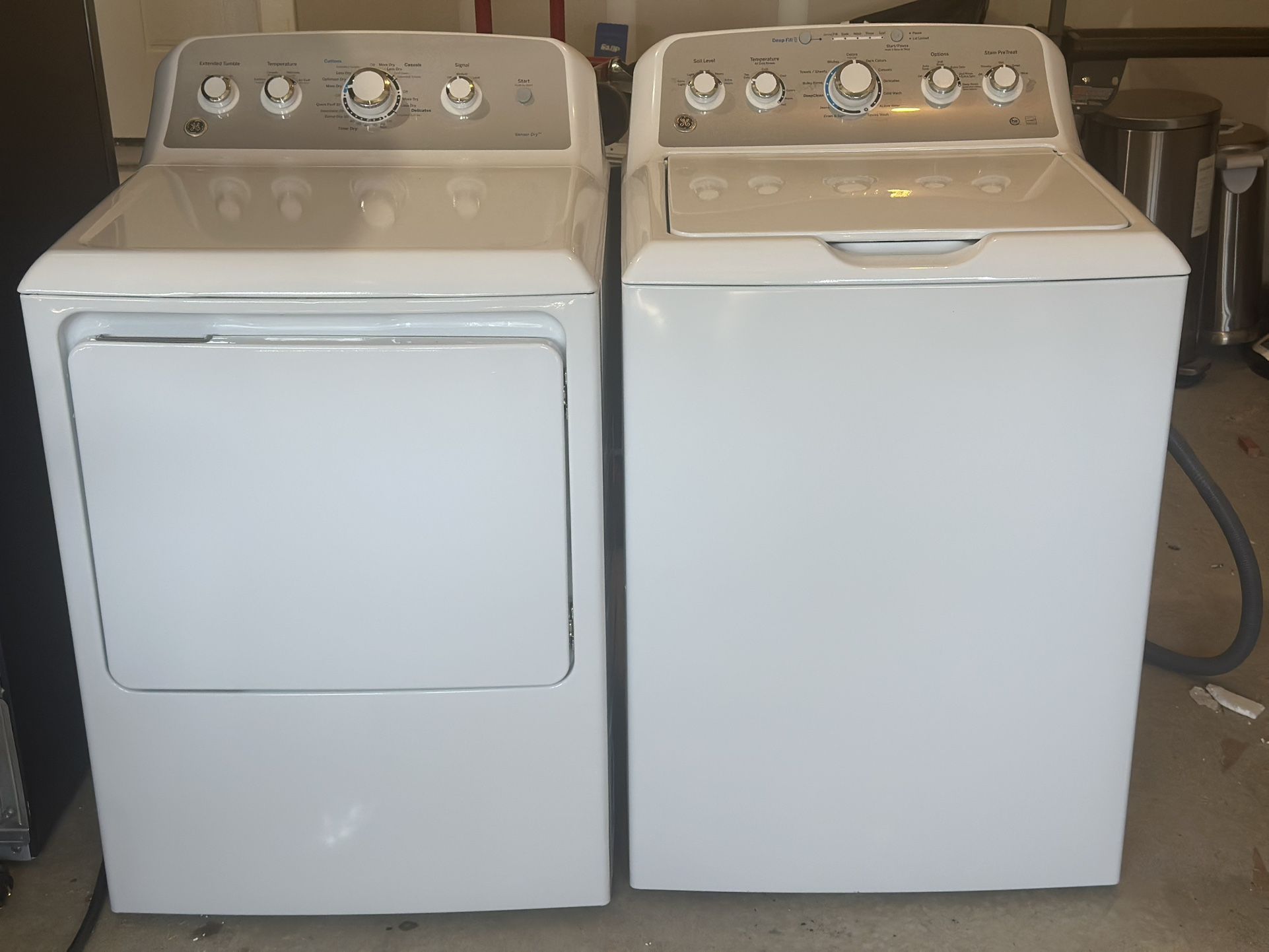 Almost new GE top load washer and front load dryer