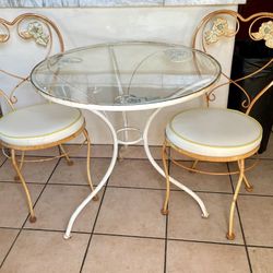 $450-!!-O. W. Lee Glass Top Wrought Iron Table And Chairs.