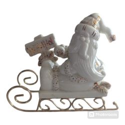 Vintage Porcelain Christmas Ho! Ho! Ho! Santa On Sled Christmas Figurine.