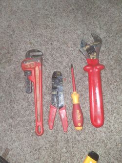 Pipe wrench, wire cutters, Wiha screw driver, wrench