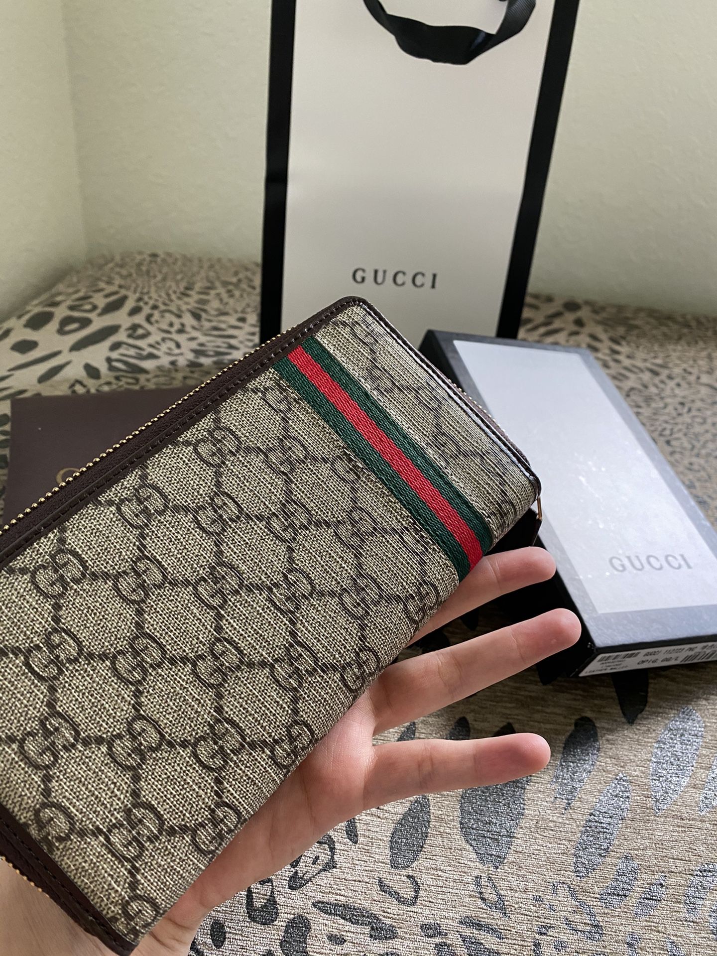 Gucci Web GG Supreme zip around wallet