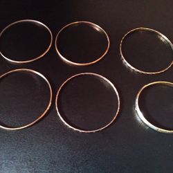 Six Bracelets For $10.00. Color Are Gold And Silver. 