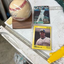 Authenticated Ken Griffey Junior signed to baseball and assorted baseball cards