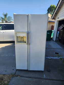 Large size 2 door fridge: Runs Average.