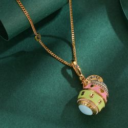 Juicy enamel glaze fashionable openable heart-shaped egg pendant necklace, featuring a luxurious black dog charm, perfect for a sweater chain