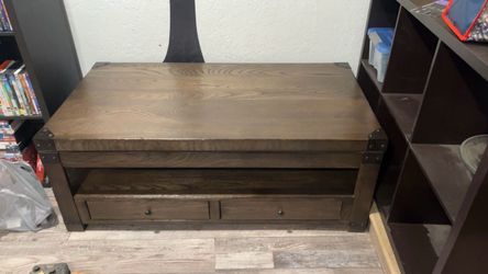 Coffee table with lift top