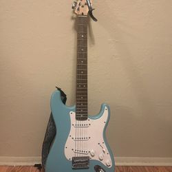 Squier Electric Guitar with Capo and Guitar Strap