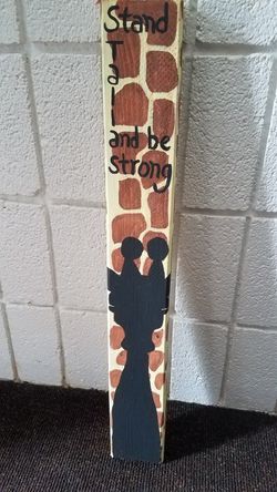 handpainted wooden giraffe sign