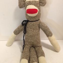 Sock monkey type 20”Tall hand made stuffed Animal. Well made well cared for. 