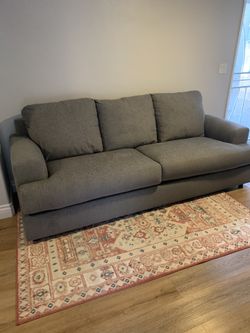 Gray Living Spaces Couch