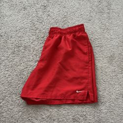 red nike shorts