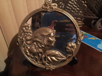 Antique brass mirror
