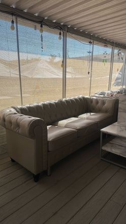 Two Sofas with one coffee table and two sides