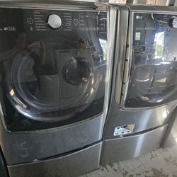 LG 5.2 Cu. Ft. Smart Front Load Washer and 9 Cu. Ft Electric Dryer in Black Steel With Pedestal