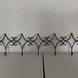 Decorative metal wall rack