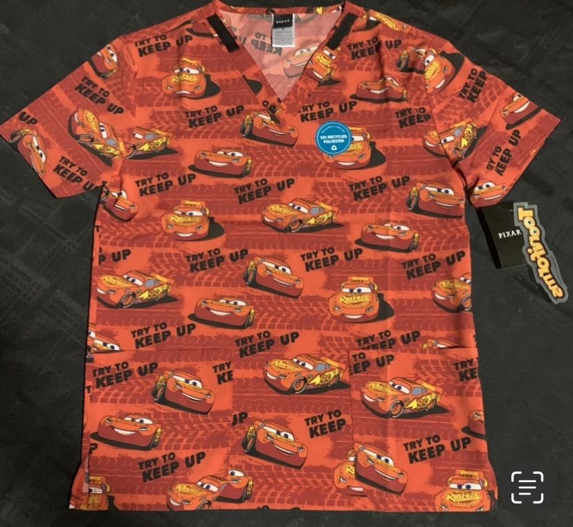 New Tooniforms Disney Pixar Cars Lightning McQueen women or men size small polyester and spandex scrub top