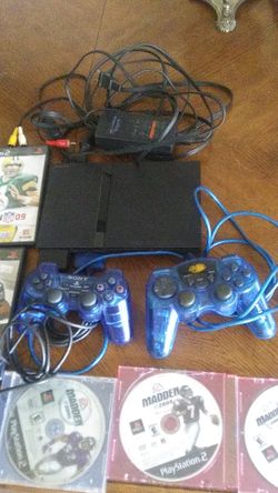 PS2 SLIM W 2 CONTROLLERS PLUS 1 8GB MEMORY CARD AND 5 MADDEN GAMES