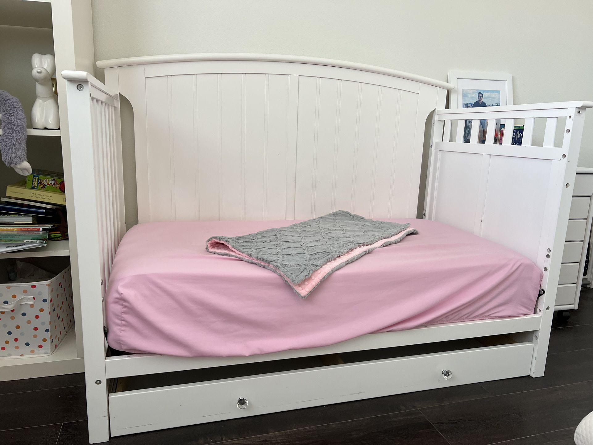 White Convertible Baby Crib with Nightstand. 
