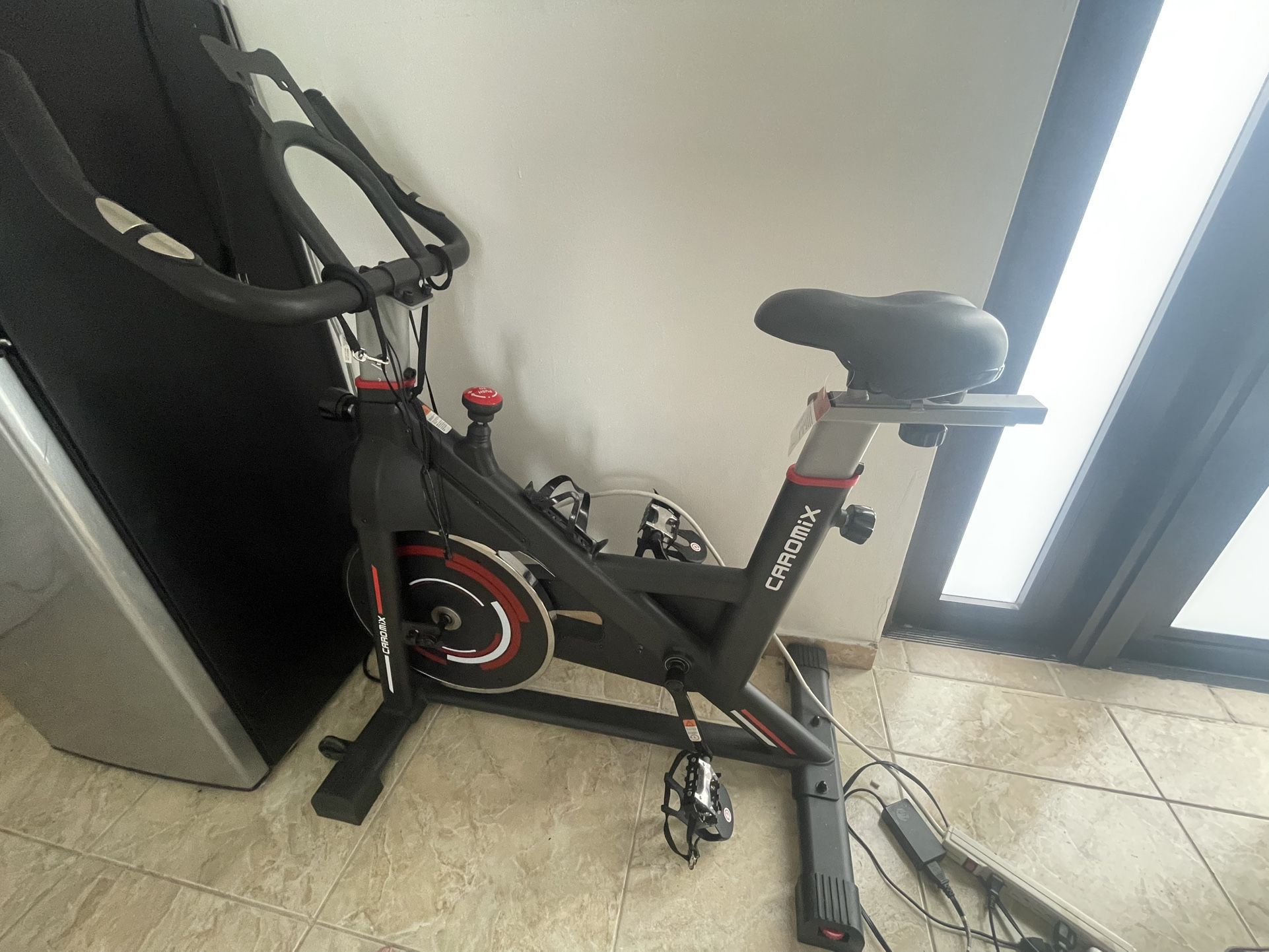 Caromix Exercise Bike Indoor Stationary Bike with Comfortable Seat Cushion, Monitor with Pulse & Ipad Mount for Home Cardio Gym with 300lbs Weight Cap