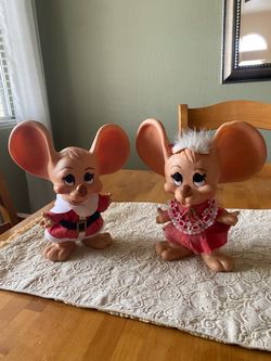 Vintage 1970s big eared plastic Santa & Mrs. Clause mice . Wearing Christmas outfits .