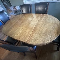 42” Round Dining Room Table with 2 Leafs and 6 Chairs
