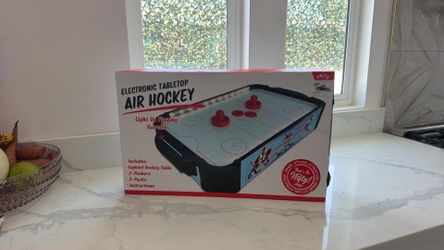 Nifty electronic air hockey table