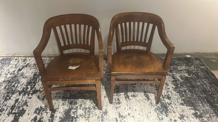 2 classic curved gunlocks chairs