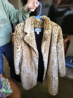 Lepord  coat fake furr never worn larfe